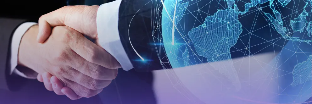 Two people shaking hands in front of a digital globe with network lines, symbolizing international cooperation and business partnership